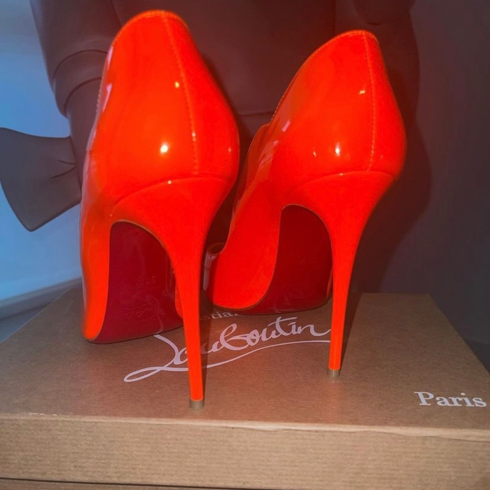 Orange Christian louboutin “HOT CHICK”